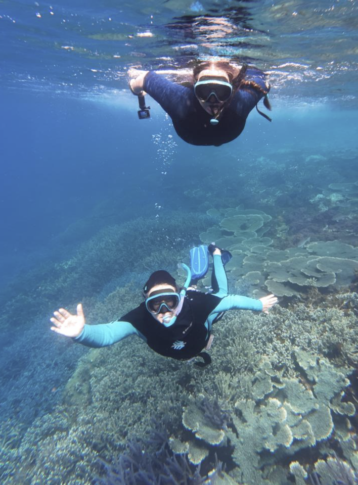 Two ladies snorkelling over coral at the Abrolhos Islands